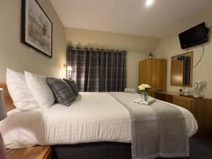 Postel nebo postele na pokoji v ubytování St Michaels Inn