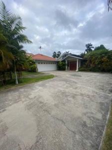 an empty driveway in front of a house at Best Vacation rental house close to Kahala Beach ! in Honolulu