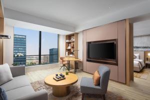 TV a/nebo společenská místnost v ubytování Metropark Hotel Hongqiao Shanghai