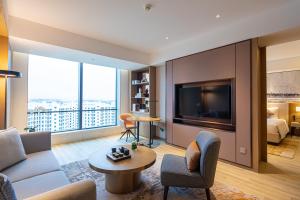 TV a/nebo společenská místnost v ubytování Metropark Hotel Hongqiao Shanghai