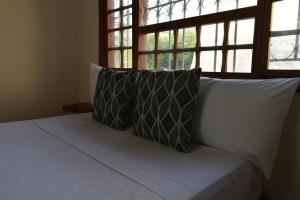 Voodi või voodid majutusasutuse Hostal Magdalena toas