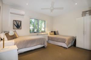 En eller flere senge i et værelse på The Sanctuary