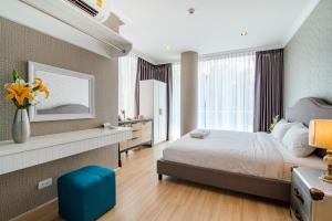 Postel nebo postele na pokoji v ubytování Hua Hin My Resort 3BR Family Condo Free Water Park Walk to Beach & Cicada Night Market หัวหิน ห้องแฟมมิลี่ 3 ห้องนอน ฟรีสวนน้ำ ใกล้ทะเลและตลาดซิเคด้า