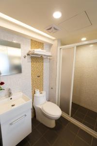 Koupelna v ubytování Wecan Hotel