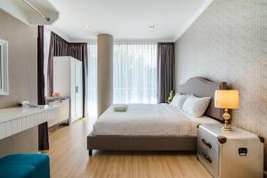 Postel nebo postele na pokoji v ubytování Hua Hin My Resort 3BR Family Condo Free Water Park Walk to Beach & Cicada Night Market หัวหิน ห้องแฟมมิลี่ 3 ห้องนอน ฟรีสวนน้ำ ใกล้ทะเลและตลาดซิเคด้า