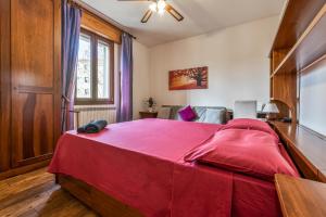 A bed or beds in a room at B&B Selvarossa