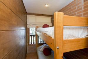 Postel nebo postele na pokoji v ubytování Linda Vista Apart Hotel