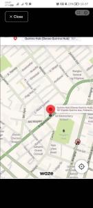 een Google-kaart met een rode markering erop bij Quirino hub 2 BR family room in Davao City