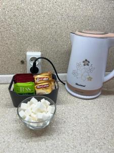 Удобства за правене на кафе и чай в Квартира бизнес класса