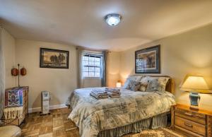a bedroom with a large bed and a window at Bethesda Apartment and Yard about 9 Mi to D C in Bethesda