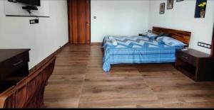 Postel nebo postele na pokoji v ubytování Chitrangan Homestay