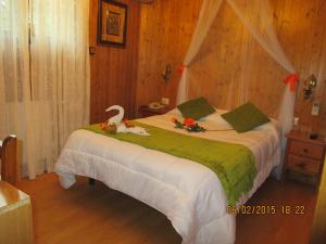Łóżko lub łóżka w pokoju w obiekcie Hotel Playa Samil Vigo