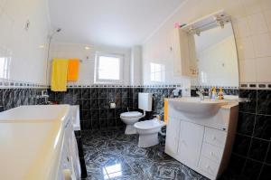 Koupelna v ubytování Apartments Marija Petricevic + 27 fotografií