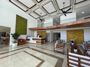 a large living room with a ceiling at Luxury 5 Star Suite At Samana W Marina & Ocean Views in Santa Bárbara de Samaná