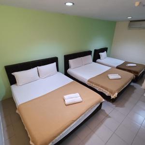 Postel nebo postele na pokoji v ubytování Best One Hotel + 37 fotografií