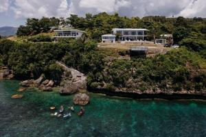 Letecký snímek ubytování Exclusive Cliff House with Pool and Beach Access