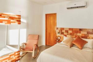 Letto o letti in una camera di Exclusive Cliff House with Pool and Beach Access
