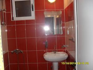 Ένα μπάνιο στο Apartment Batricevic