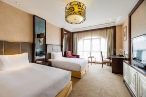 TV a/nebo společenská místnost v ubytování S&N Hotel Chaohu