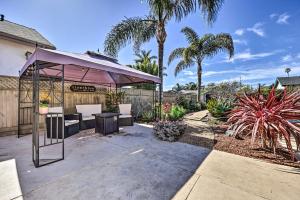 a gazebo in a yard with palm trees at Santa Barbara Home with Private Outdoor Pool! in Santa Barbara