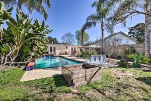 un patio trasero con piscina y una casa en Santa Barbara Home with Private Outdoor Pool! en Santa Bárbara