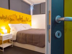 A bed or beds in a room at Blocco Sauli