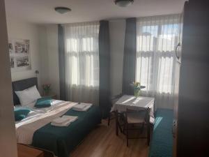 Posteľ alebo postele v izbe v ubytovaní Willa Julia