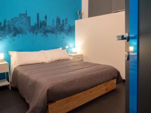 A bed or beds in a room at Blocco Sauli