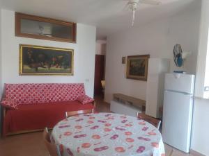 Postel nebo postele na pokoji v ubytování Appartamenti Le Fontanelle