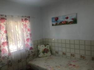 Łóżko lub łóżka w pokoju w obiekcie Tranquila Casa de Campo cerca de Chiclana