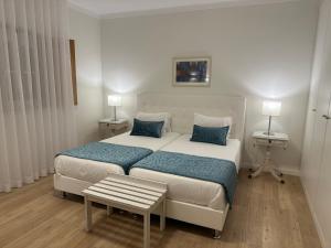 Cama ou camas em um quarto em Casa Da Padeira - Turismo Rural