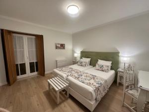 Cama ou camas em um quarto em Casa Da Padeira - Turismo Rural