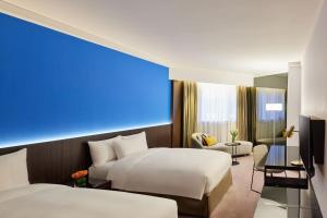 Ліжко або ліжка в номері Prince Hotel, Marco Polo