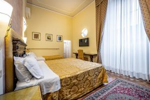 Katil atau katil-katil dalam bilik di Hotel Alessandra