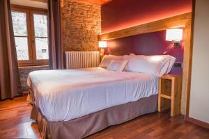 Cama o camas de una habitación en Hotel Hostal Estrella