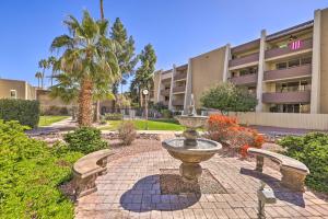 a fountain in a courtyard in front of a building at Scottsdale Resort Condo Near Old Town! in Scottsdale