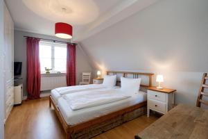 Un pat sau paturi într-o cameră la Haus Constanze