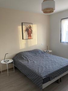 Posteľ alebo postele v izbe v ubytovaní Ferme Hôtel Boulage