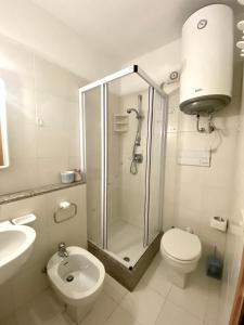 Um banheiro em Residence Porto Coda Cavallo