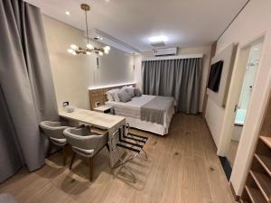 Postel nebo postele na pokoji v ubytování Ônix Hotel