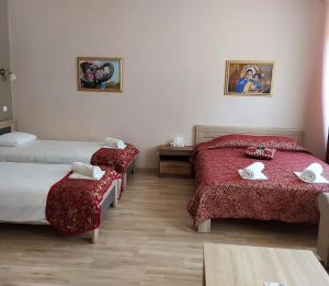 Postel nebo postele na pokoji v ubytování Citystop Majutuskeskus