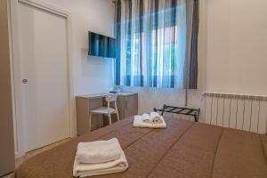 Postel nebo postele na pokoji v ubytování Casa Lighea Mondello - 200 mt dalla spiaggia