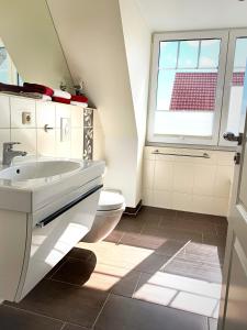 Ένα μπάνιο στο Ferienwohnungen Haus Sommerlust +111 φωτογραφίες