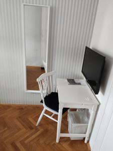 TV o dispositivi per l'intrattenimento presso Selection Rooms