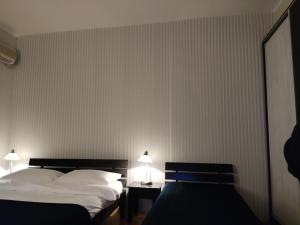 Letto o letti in una camera di Selection Rooms