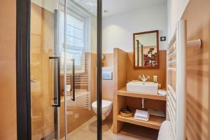 Koupelna v ubytování Hôtel de Charme Bello Visto + 37 fotografií