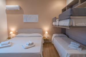 Postel nebo postele na pokoji v ubytování Casa Lighea Mondello - 200 mt dalla spiaggia