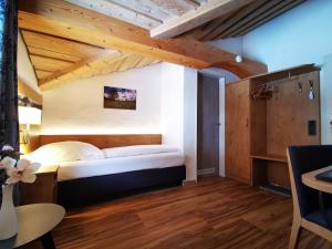 Postel nebo postele na pokoji v ubytování Gasthof & Hotel Zur Post