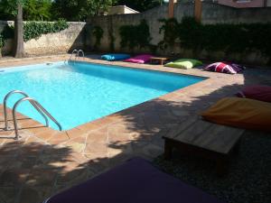 The swimming pool at or close to Auberge de Correns