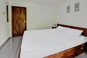 Postel nebo postele na pokoji v ubytování Tastura Homestay